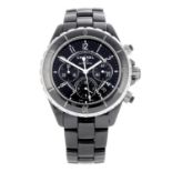 CHANEL - a J12 chronograph bracelet watch. Ceramic case with calibrated bezel and stainless steel