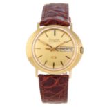 BULOVA - a gentleman's Accuquartz wrist watch. 9ct yellow gold case, import hallmarked London