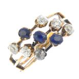 A sapphire and diamond dress ring. Of asymmetric design, the old-cut diamond and oval-shape sapphire