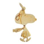 A 9ct gold 'Snoopy' pendant. Designed as Snoopy wearing flying apparel. Hallmarks for London,