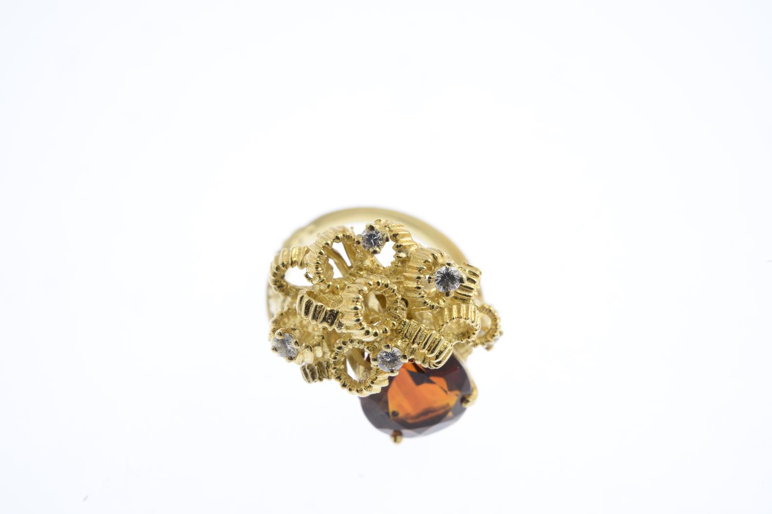 A citrine and diamond dress ring. Of abstract design, the pear-shape citrine, with textured ribbon - Image 3 of 3