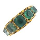 A mid Victorian 15ct gold soude emerald and paste five-stone ring. The graduated cushion-shape soude