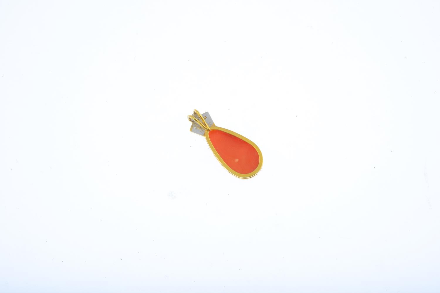 A coral and diamond pendant. The pear-shape coral cabochon, suspended from a brilliant-cut diamond - Image 2 of 2