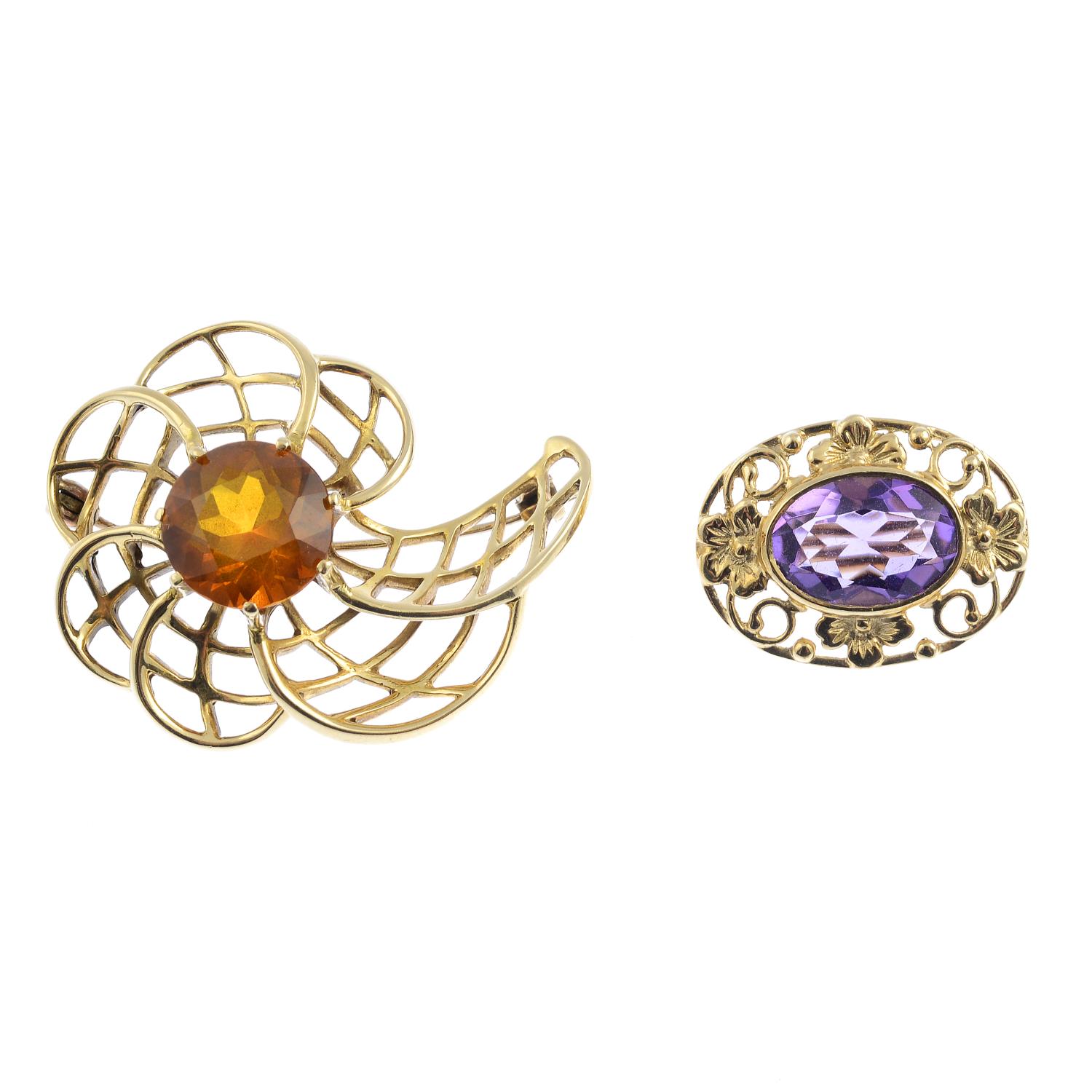 Two 9ct gold gem-set brooches. Each of openwork design, the first designed as a stylised flower with
