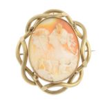 A mid Victorian gold shell cameo brooch. Of oval outline, carved to depict the goddesses of 'Day and