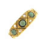 A late Victorian 18ct gold turquoise and diamond ring. The graduated circular turquoise cabochon