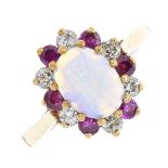 A 9ct gold opal, diamond and ruby ring. The oval opal cabochon, within a circular-shape ruby and