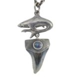 A shark tooth and opal necklace and a bangle. The necklace designed as a shark tooth drop, with an