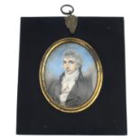 A late Georgian oval painted portrait miniature. Depicting a gentleman in a grey coat and white