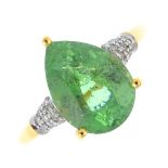 An 18ct gold tourmaline and diamond dress ring. The pear-shape yellowish-green tourmaline, with