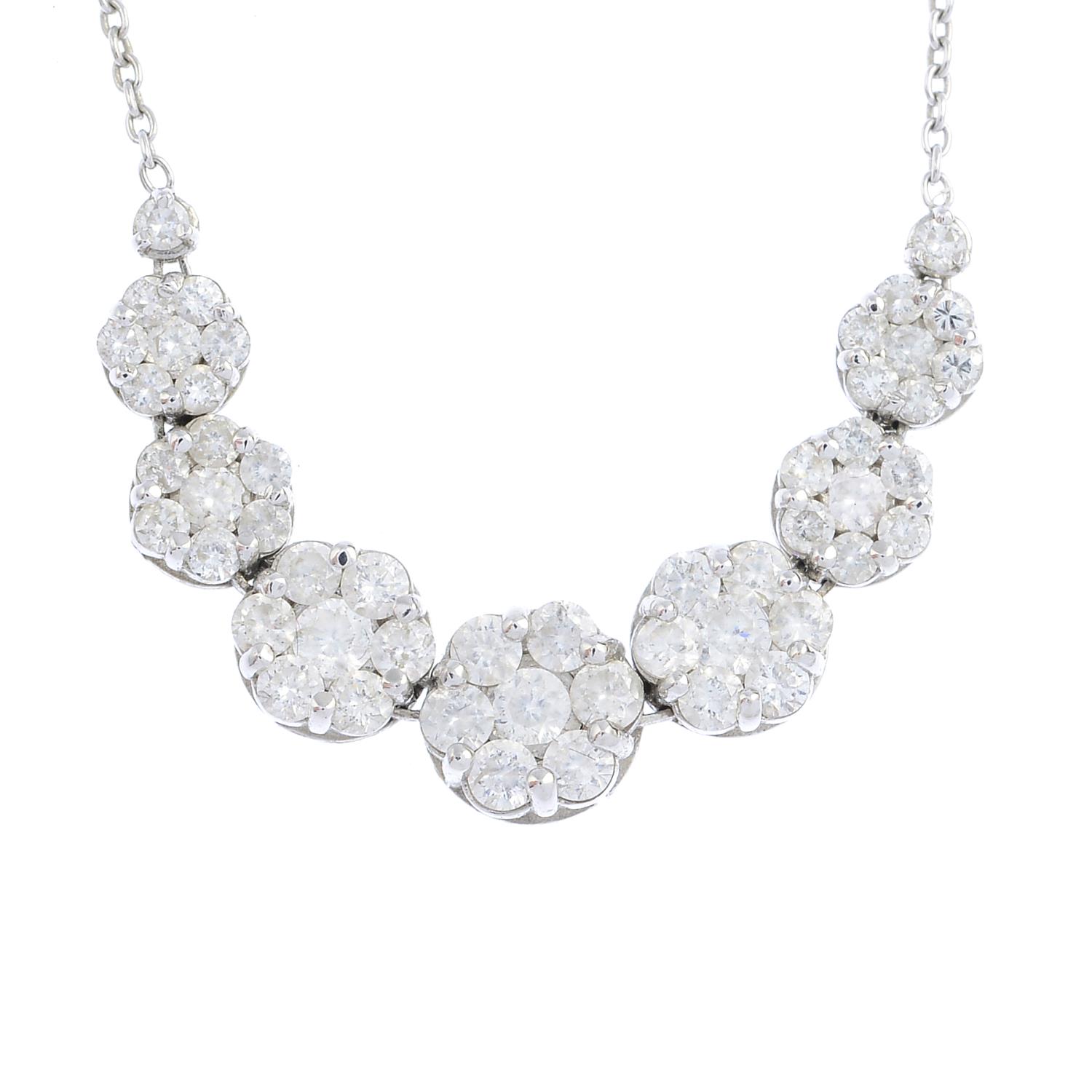 A diamond necklace. Designed as a graduated series of brilliant-cut diamond clusters, with