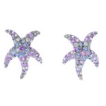 A pair of sapphire and diamond earrings. Each designed as pave-set diamond, blue and pink sapphire