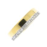 An 18ct gold diamond full eternity ring. Of bi-colour design, the brilliant-cut diamond line, offset