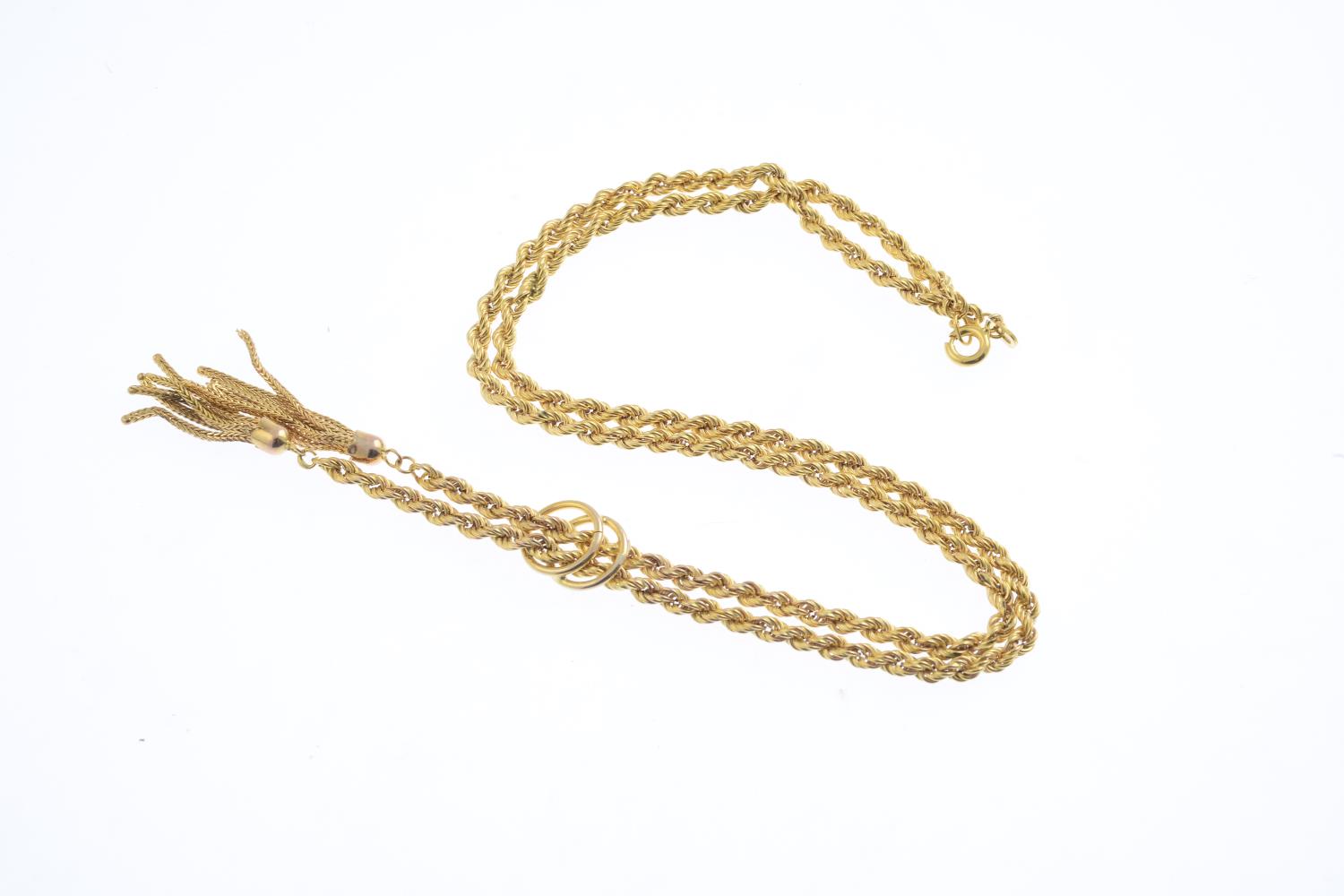 A 1980s 9ct gold rope twist necklace. Designed as two tassels, suspended from a rope-twist chain, - Image 2 of 2