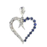 A diamond and sapphire heart pendant. Designed as a single-cut diamond and circular-shape sapphire