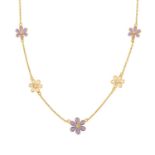 An enamel and cubic zirconia daisy child's necklace. Designed as a series of purple and white enamel