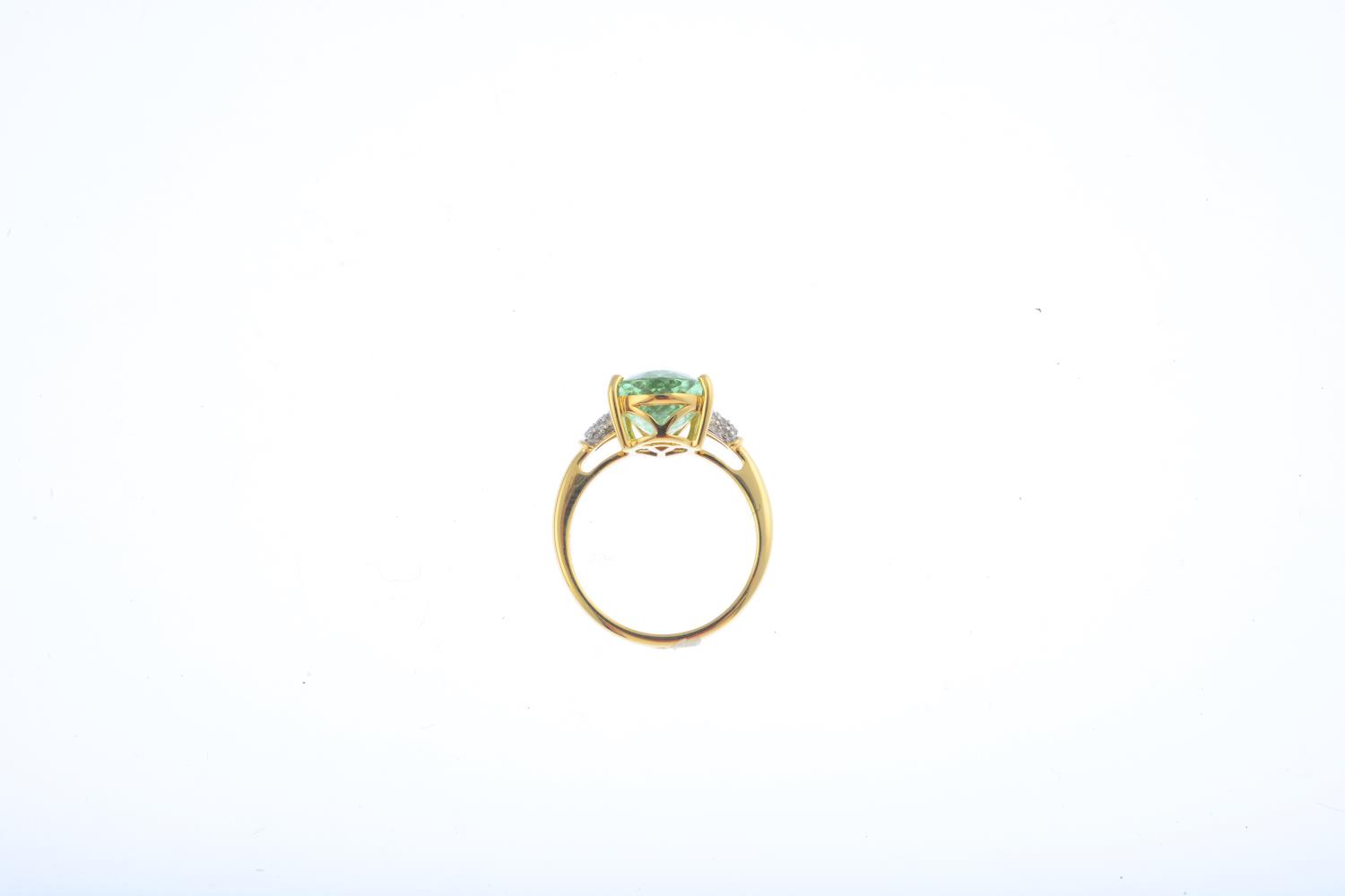 An 18ct gold tourmaline and diamond dress ring. The pear-shape yellowish-green tourmaline, with - Image 2 of 3