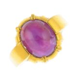 (205872) A star ruby single-stone ring. The oval six-ray star ruby cabochon, with grooved