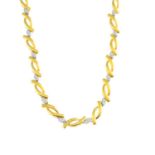 An 18ct gold diamond necklace. Designed as a series of curved asymmetric links, with brilliant-cut