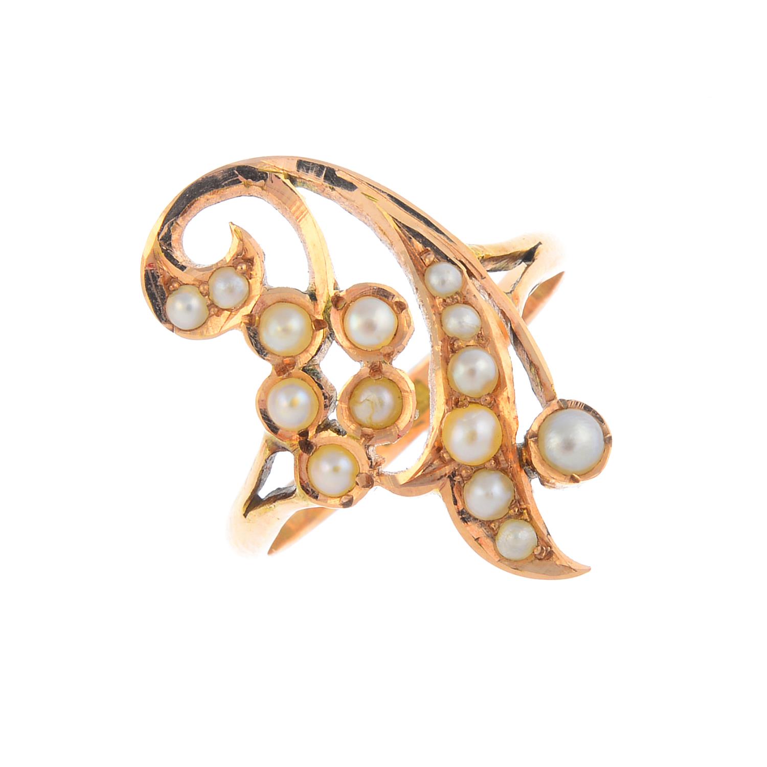 An early 20th century 14ct gold split pearl dress ring. Of openwork design, the split pearl