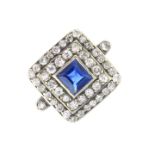 A sapphire and diamond cluster ring. The square-shape sapphire, with single-cut diamond surrounds