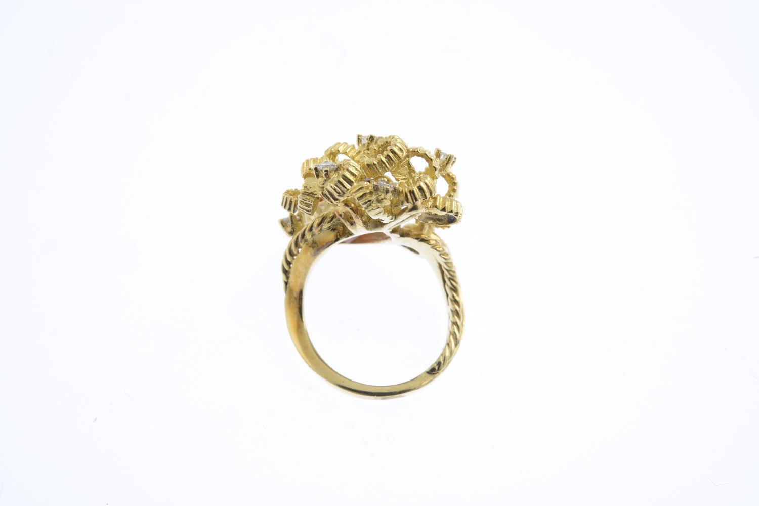 A citrine and diamond dress ring. Of abstract design, the pear-shape citrine, with textured ribbon - Image 2 of 3