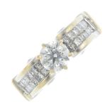 An 18ct gold diamond dress ring. The brilliant-cut diamond, with pave-set diamond shoulders and