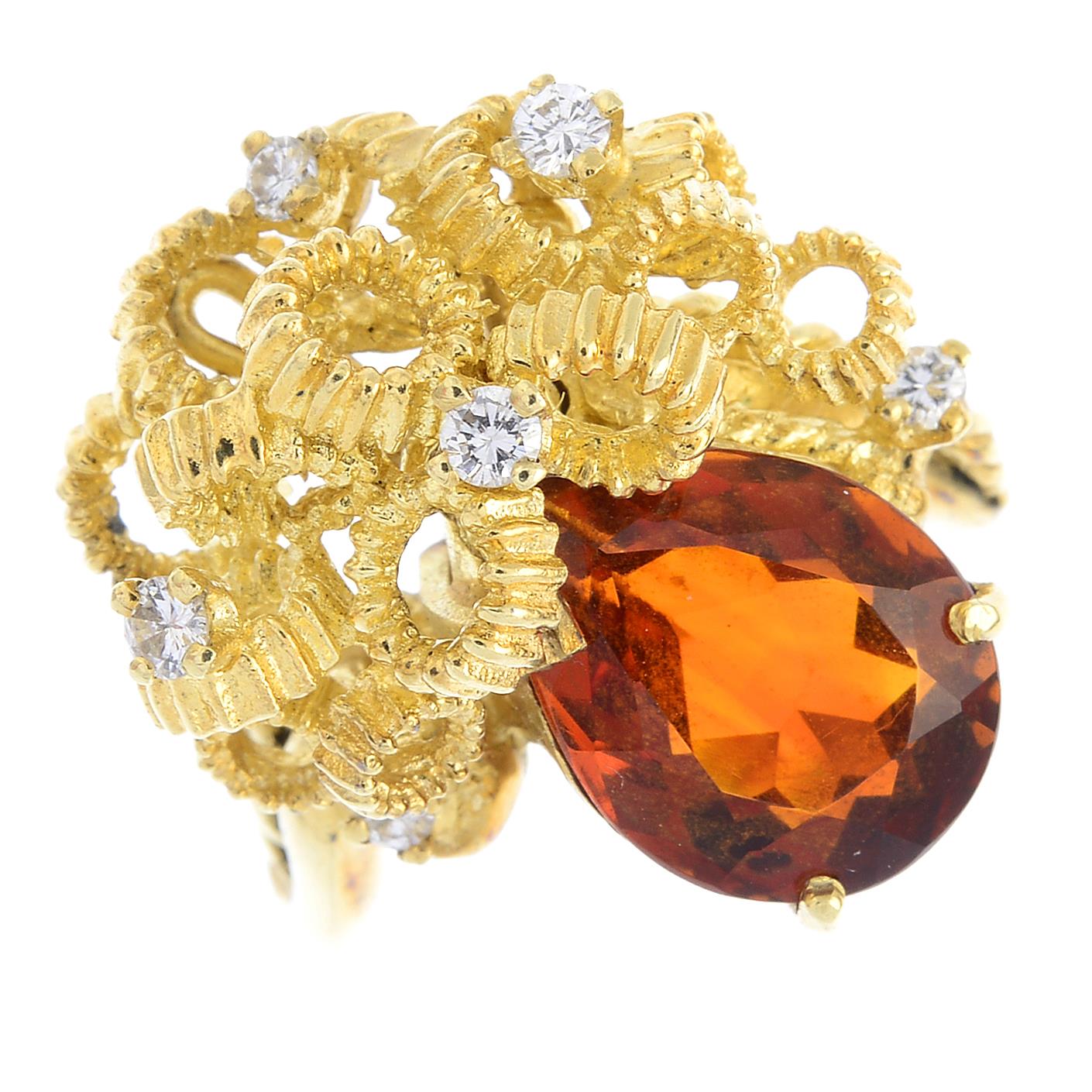 A citrine and diamond dress ring. Of abstract design, the pear-shape citrine, with textured ribbon