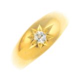 An early 20th century 18ct gold diamond ring. The old-cut diamond, star-set to the tapered band.