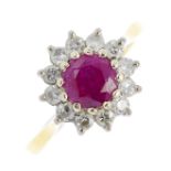 An 18ct gold ruby and diamond cluster ring. The circular-shape ruby, with brilliant-cut diamond