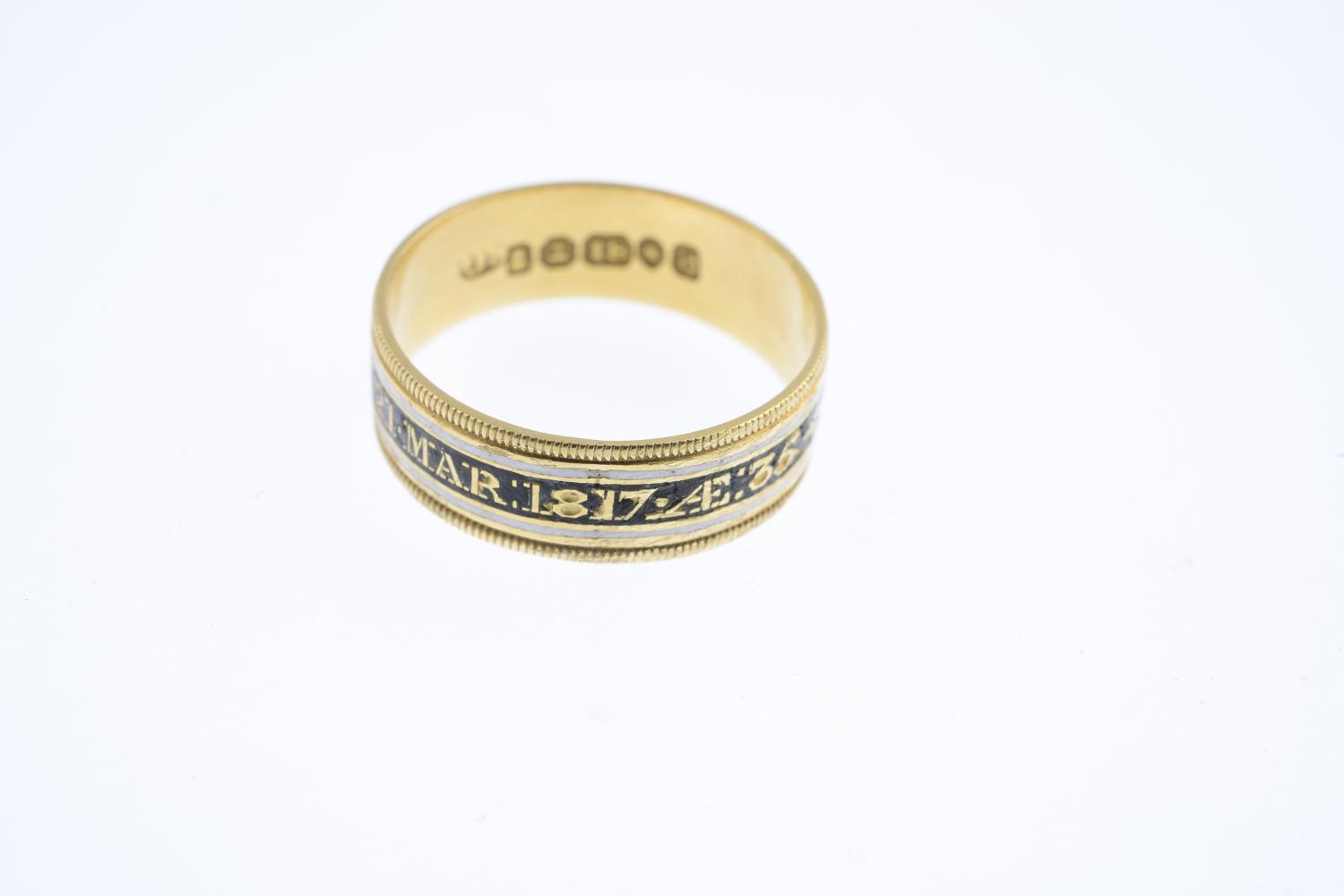 A late Georgian 18ct gold enamel memorial band ring. The black and white enamel band, reading ' - Image 2 of 3