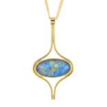 A 9ct gold opal triplet necklace. The oval-shape opal triplet, with geometric surround, suspended