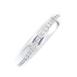 An 18ct gold diamond full eternity ring. Designed as a brilliant-cut diamond undulating line,