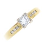 An 18ct gold diamond single-stone ring. The square-shape diamond, with brilliant-cut diamond line