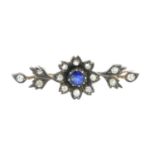 A late Victorian silver and gold, sapphire and diamond brooch. The circular-shape sapphire and old-