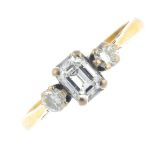 An 18ct gold diamond three-stone ring. The rectangular-shape diamond, with brilliant-cut diamond