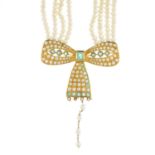 (210168) A cultured pearl and emerald necklace. The openwork bow, set throughout with cultured