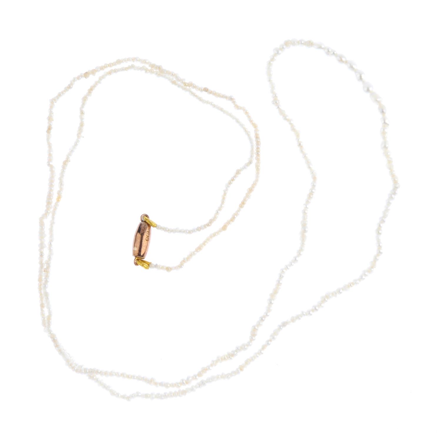 A seed pearl single-strand necklace. Comprising a single row of graduated seed pearls, measuring 2.6 - Image 3 of 3