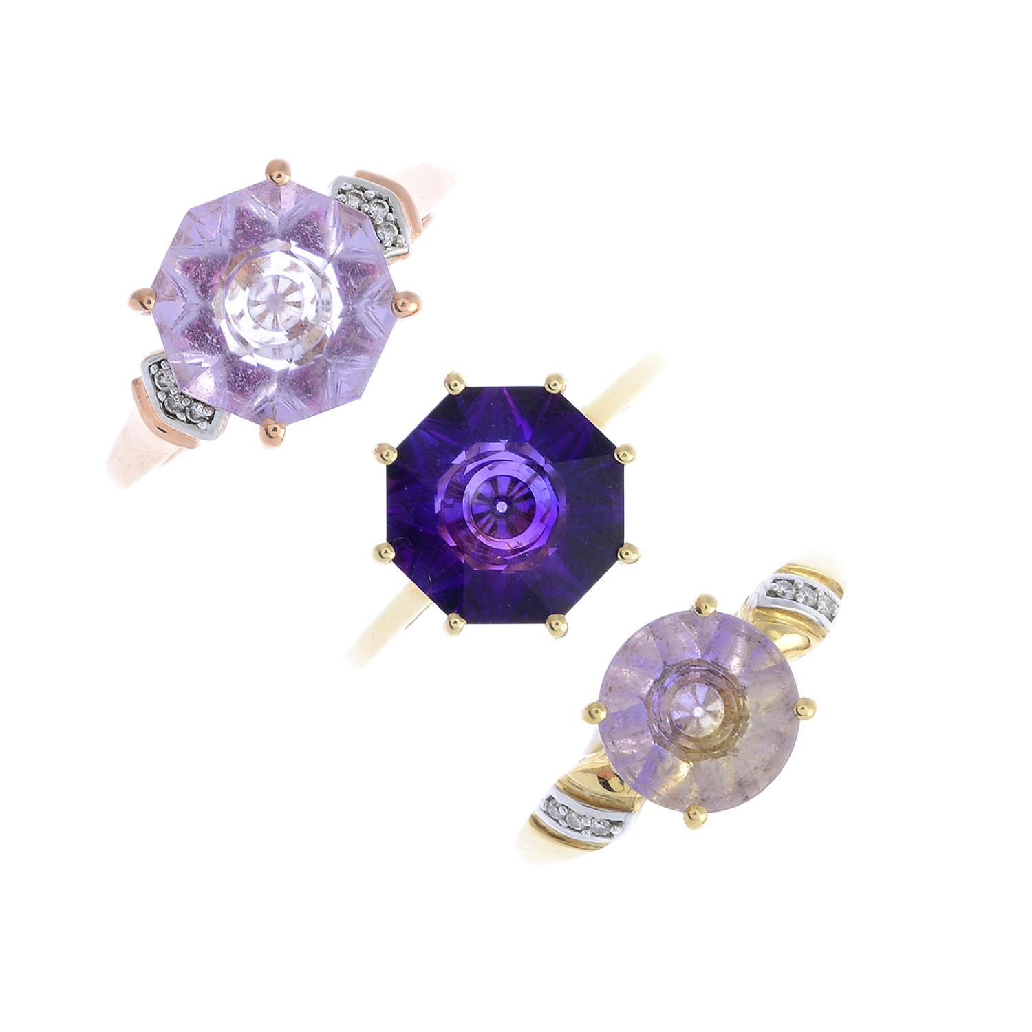 Four 9ct gold gem-set rings and a pair of earrings. To include an amethyst and diamond dress ring,