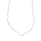 A seed pearl single-strand necklace. Comprising a single row of graduated seed pearls, measuring 2.6