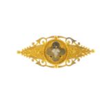 A late Victorian gold diamond brooch. Of marquise-shape outline, the single-cut diamond trefoil,