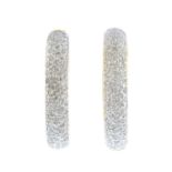 (205944) A pair of diamond hoop earrings. Each of bi-colour design, pave-set with brilliant-cut