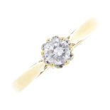 An 18ct gold diamond single-stone ring. The brilliant-cut diamond, with tapered shoulders. Estimated