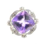 An amethyst dress ring. The cushion-shape amethyst, with grooved surround and openwork shoulders.