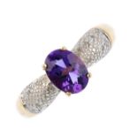 A 9ct gold diamond and amethyst ring. The oval-shape amethyst, with single-cut diamond illusion-