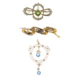 An early 20th century 9ct gold gem-set pendant and two brooches. To include a blue paste and split