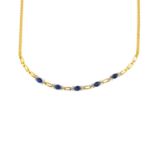 (204031) A sapphire and diamond necklace. Designed as a series of oval-shape sapphire and