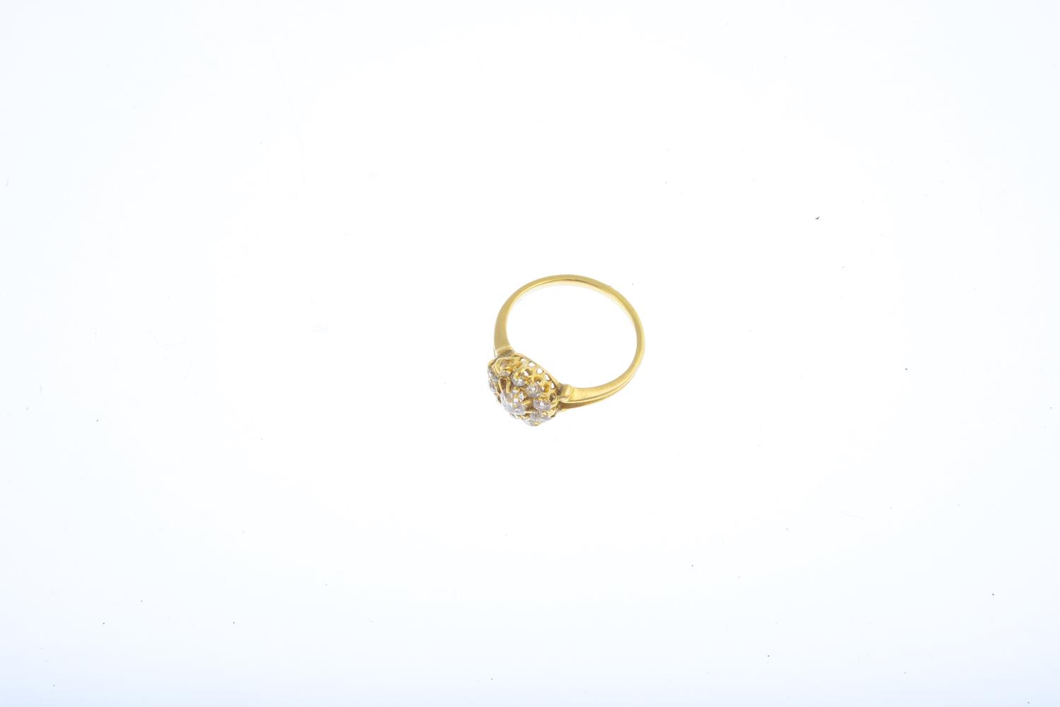 An early 20th century 18ct gold diamond cluster ring. The old-cut diamond, with similarly-cut - Image 3 of 3