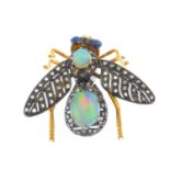 An opal and diamond insect brooch. Designed as a rose-cut diamond fly, with