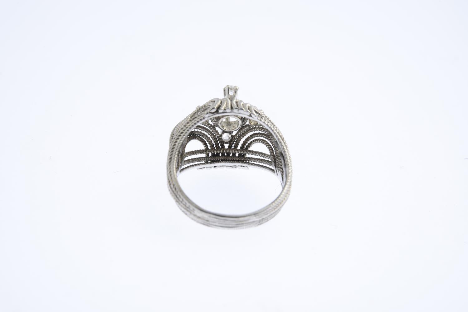A diamond dress ring. The old-cut diamond, with brilliant-cut diamond quatrefoil surround and rope- - Image 3 of 3
